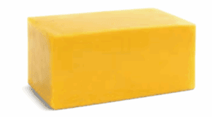 A rectangular block of solid yellow cheese photographed against a white background.